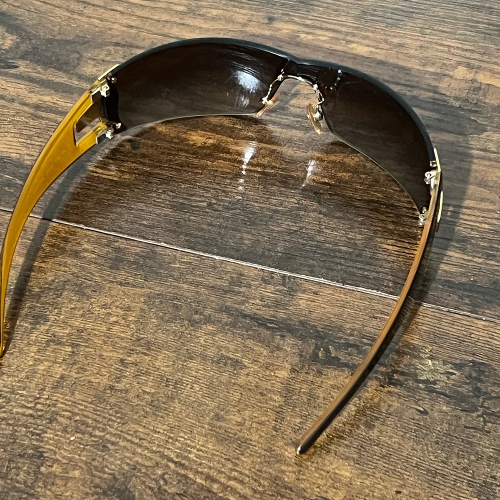 Vogue Sunglasses with Black and Gold Accents